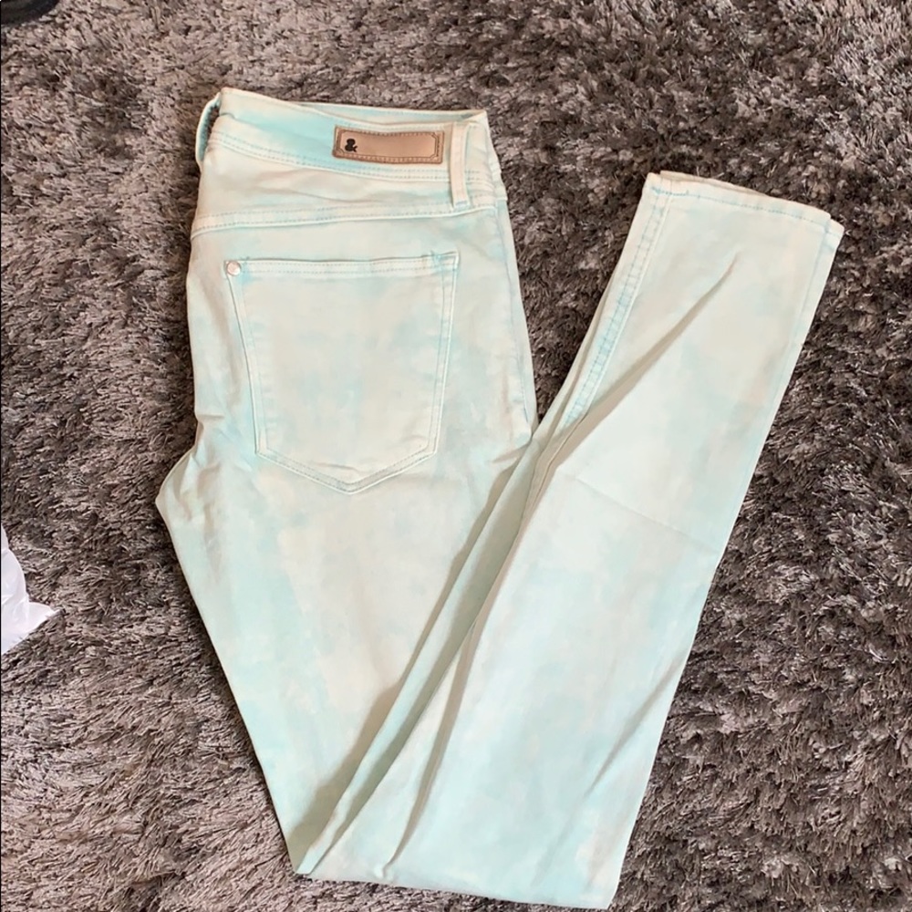 Acid wash low rise skinny jeans